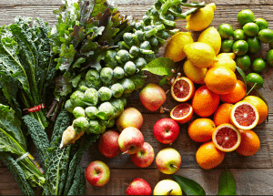 a group of fruits and vegetables on a wood surface Healthy Weight Loss Diets Ayr